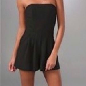 Strapless romper with pleats and fun pockets by premier designer Black Halo.